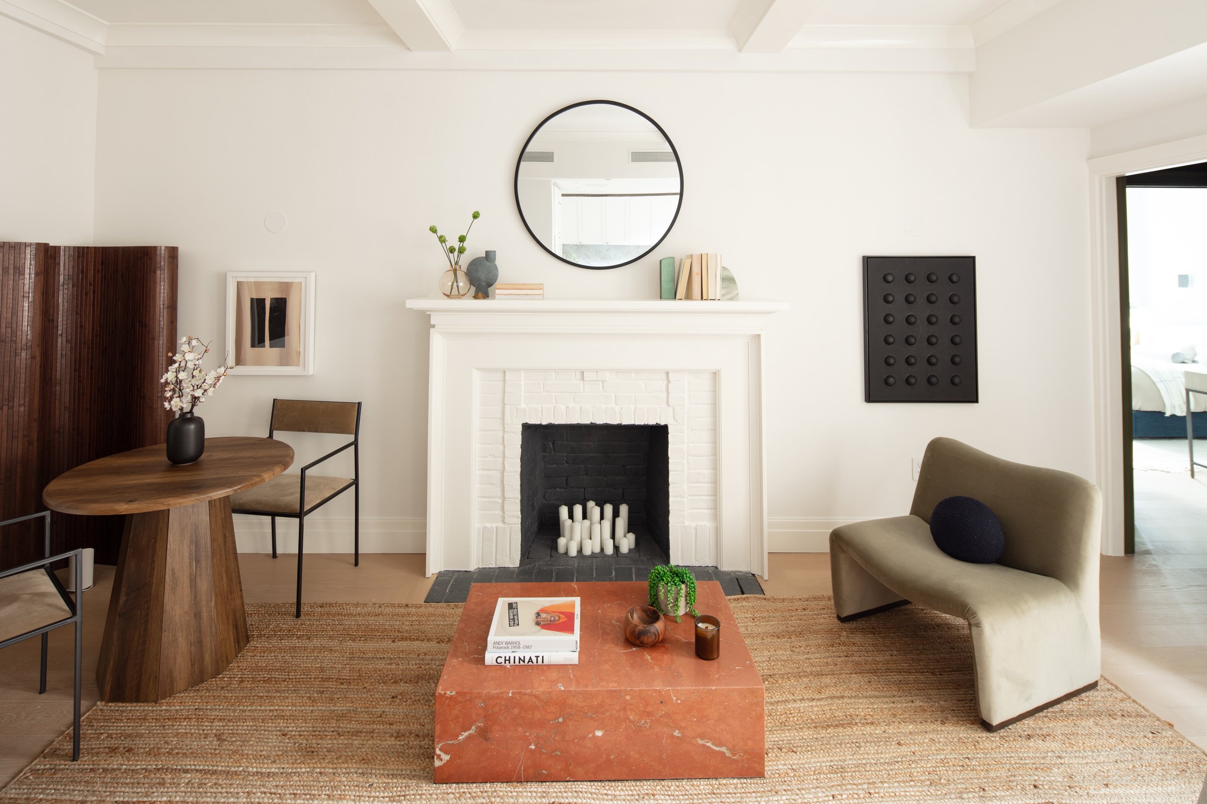 Original decorative fireplace in a one-bedroom residence