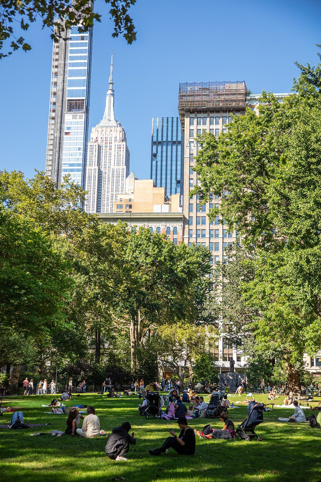 The great lawn with the Empire State Building beyond
